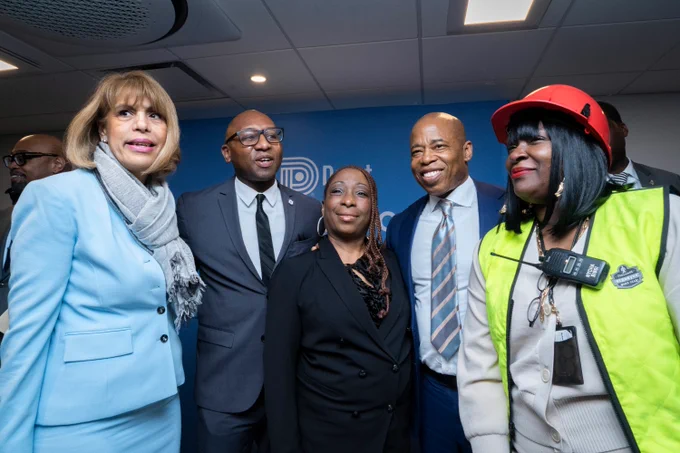 mayor and other city leaders stand together for photo