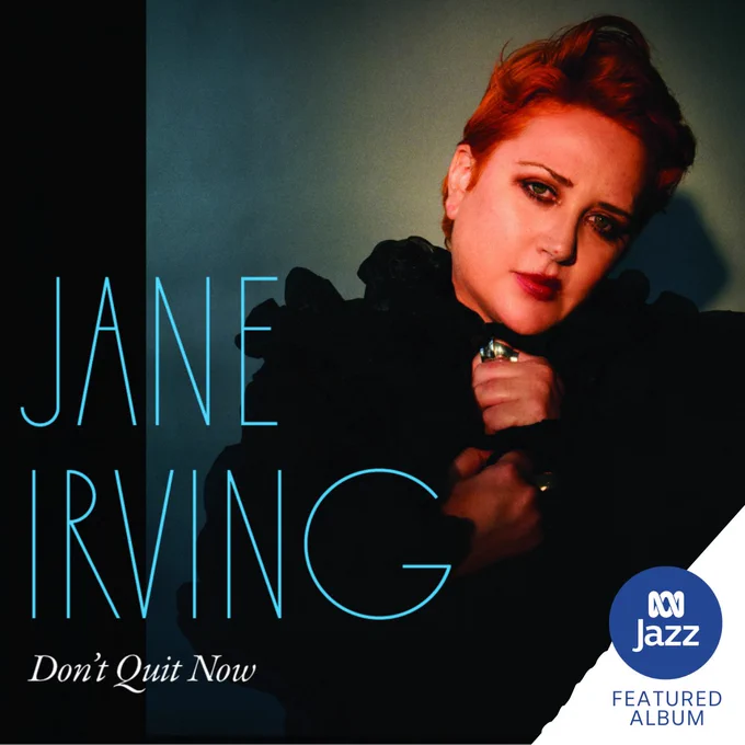 Jane Irving looking at the camera with her hands on her black jacket