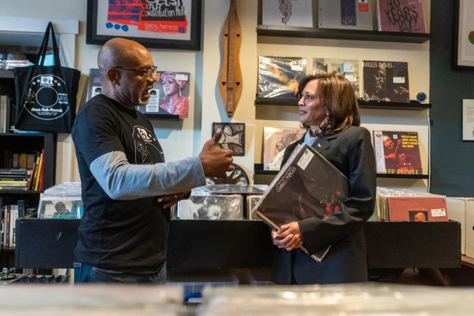 Vice President Harris speaks to HR Records owner, Charvis Campbell, in his store.