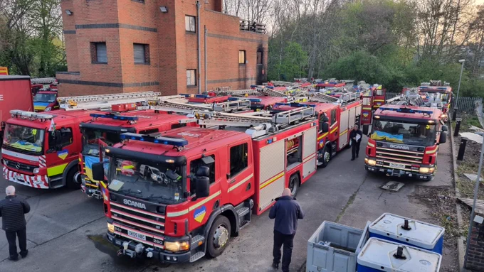Fire and rescue service vehicles parked up in the station