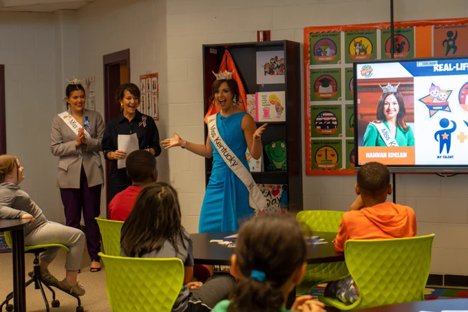 Students listen to Miss Kentucky speak.