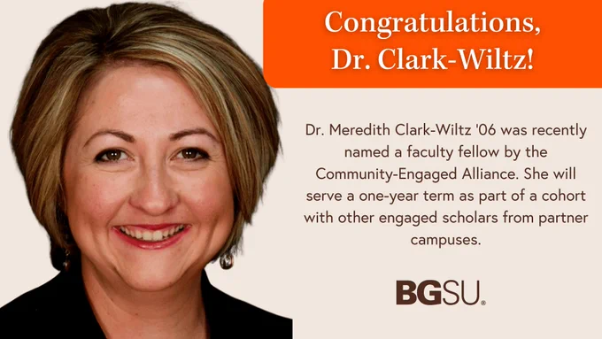A headshot portrait of BGSU alumnae Dr. Meredith Clark-Wiltz '06. There is text on screen that reads "Congratulations,
Dr. Clark-Wiltz! Dr. Meredith Clark-Wiltz '06 was recently named a faculty fellow by the Community-Engaged Alliance. She will serve a one-year term as part of a 
cohort with other engaged scholars from 
partner campuses."