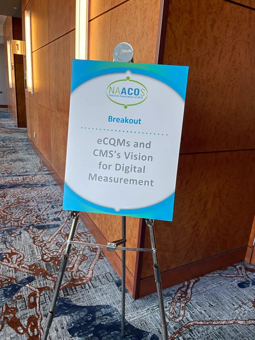 Sign outside breakout room session "eCQMs and CMS' Vision for Digital Measurement"