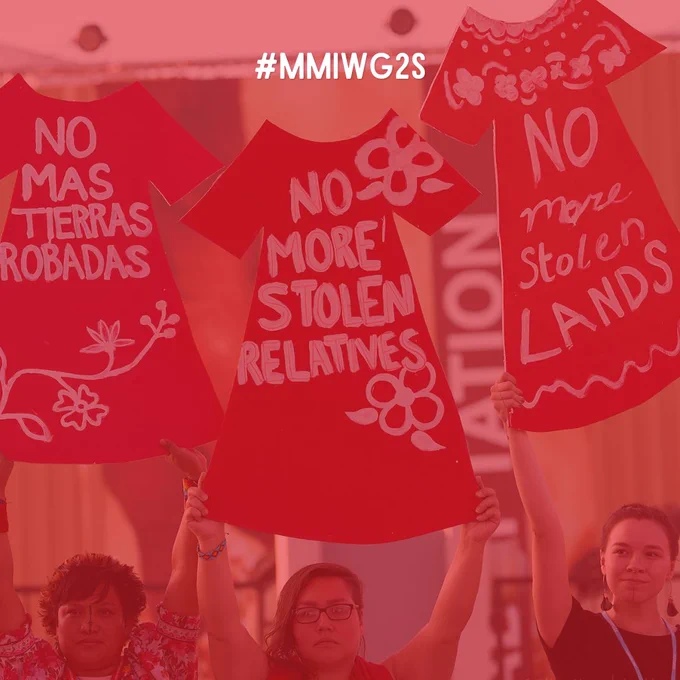 MMIWG2S demonstration at COP27 with a transparent red overlay, and text that reads: "#MMIWG2S"
