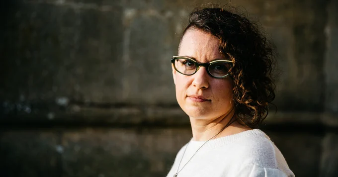 Maggie Downham, a family educator at INCLUDEnyc, a nonprofit that helps students with disabilities, was discussing work issues with her therapist, who suggested that she and her colleagues start a union.Credit...Alexander Turner for The New York Times.