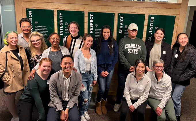 GSC members in front of the Principles of Community posters
