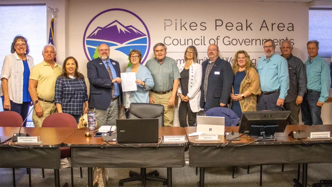 A group photo of the Pikes Peak Area Council of Governments Board of Directors recognizing May 2023 as Older Americans Month.