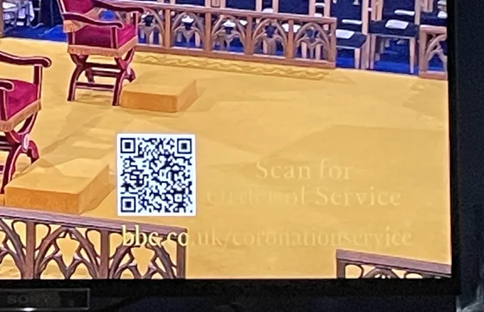 Yellow text on a yellow background as part of the coverage of the Coronation.