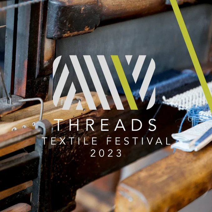 A close-up photo of a loom with the Threads Textile Festival logo over the top.