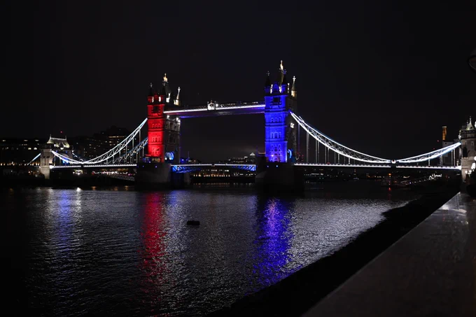 Tower Bridge lit up red, white and blue for the Coronation