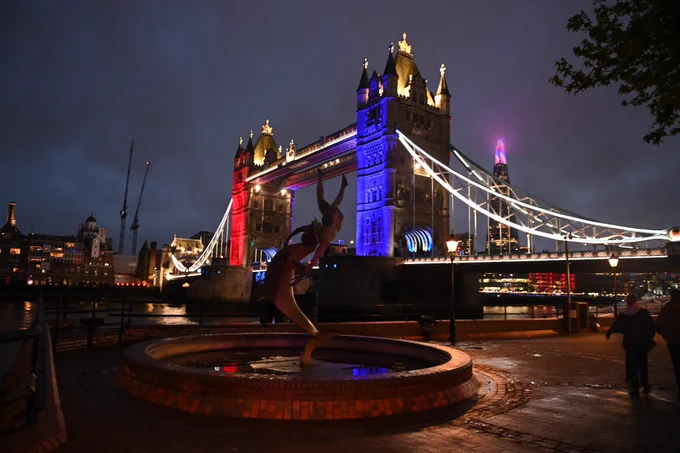 Tower Bridge lit up red, white and blue for the Coronation