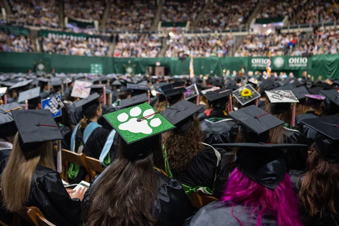 A paw print decorated cap at the Spring 2023 Commencement in Athens, Ohio.