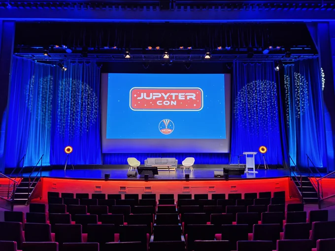 Picture of the stage of the main auditorium of JupyterCon.