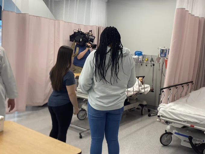 Women in a practice hospital room