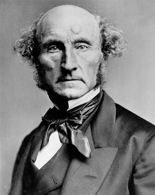 A photograph of the philosopher John Stuart Mill from 1870. Mill looks directly at the camera and is wearing a suit and necktie.