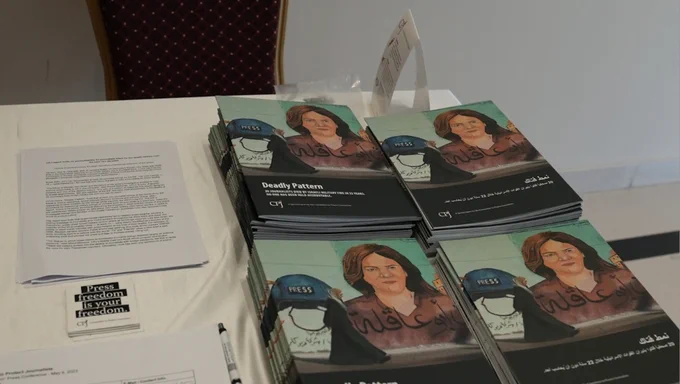 A table with printed-out copies of CPJ's report, "Deadly Pattern: 20 journalists died by Israeli military fire in 22 years. No one has been held accountable."

Photo credit: Waleed Kamar