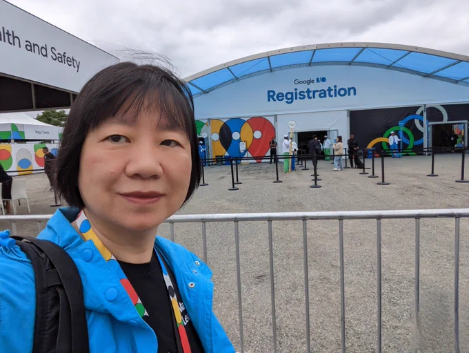 Google I/O Shoreline participant is pictured in front of the event registration area.