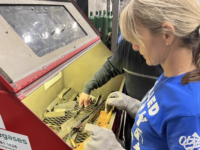 Practicing welding.