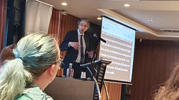 Minister Simon Harris addressing the crowd.