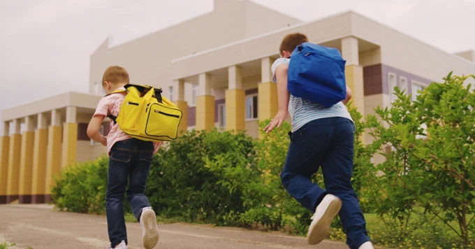 Kids running to school
