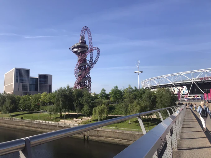 UCL East campus and London Stadium viewed from a bridge over water