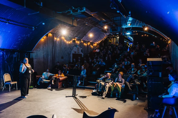 An immersive performance space with audience members. An IEN event. 