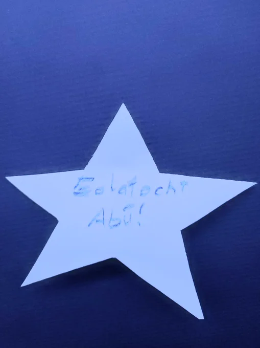 Star from the galaxy wall with "Eolaíocht Abú" written on it