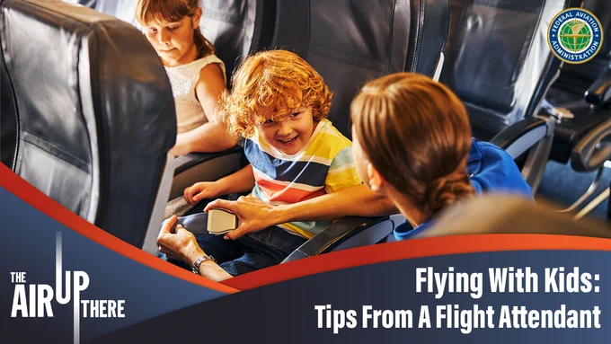 A flight attendant helps a young boy buckle his seat belt on an airplane. Text: The Air Up There. Flying With Kids: Tips From A Flight Attendant.