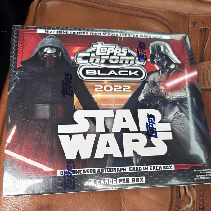 One Encased Autograph Card in Each Box!