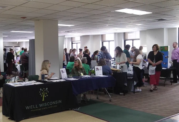 DHS staff get information at today's annual health fair. 
