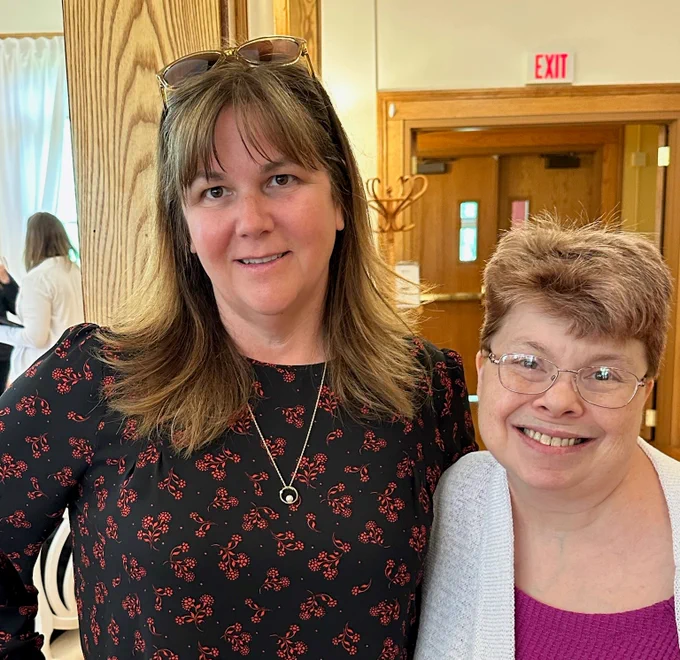 Commissioner Porter poses with DDS Self Advocate Coordinator, Carol Grabbe at the 2023 Aging Conference.