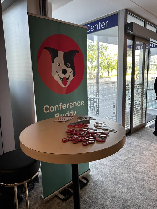 Picture of the conference buddy both right by the entrance of the venue