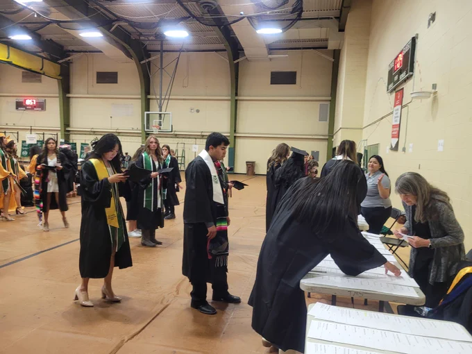 Graduates arriving in Moby for check in