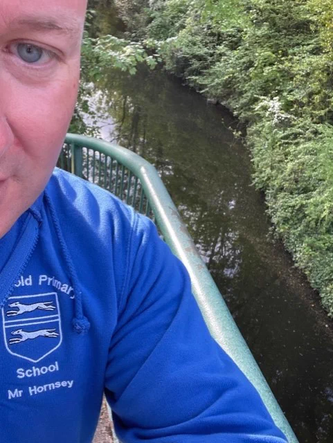 Mr Hornsey taking in the lovely view of the Grand Union canal on the way into school