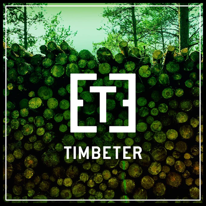 photo of a pile of logs with a green effect filter and the timbeter app logo in the center