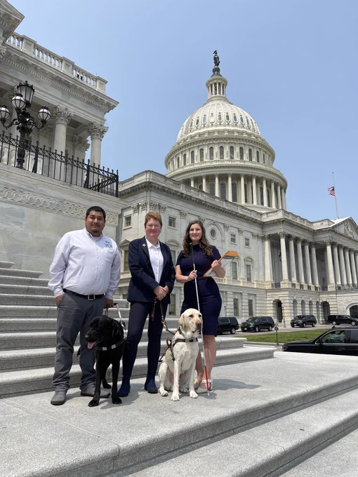 NIB Advocates Rey from Valley Center for the Blind in Fresno, CA, LightHouse CEO Sharon G., and LightHouse Communications Specialist, Caitlin, stand together on the steps of the United States Capitol Building in Washington DC