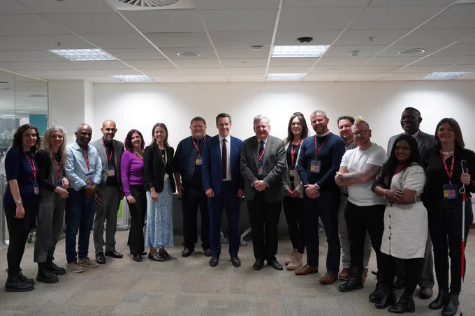 Minister for Disabled People, Tom Pursglove, in a group photo with the BSL Advisory Board.