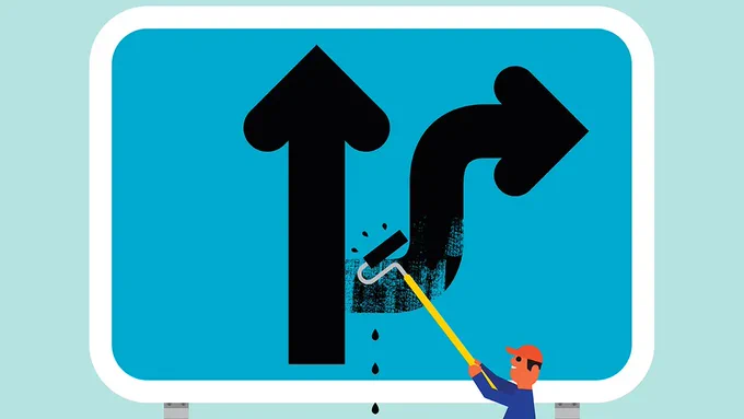 Man painting two arrows: one pointing up, the other curving to the right
