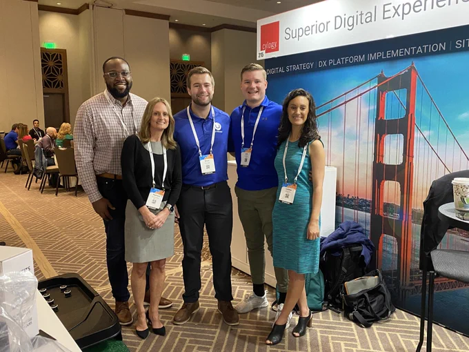 The Umbraco team is posing with the Cylogy team at CMSWire CONNECT.
