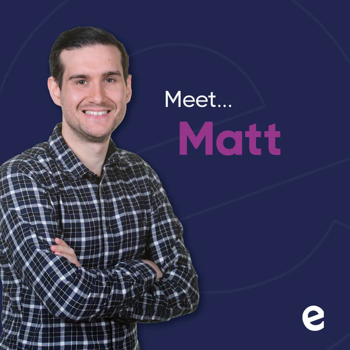 Photo of Matt C from Team Epix standing with his arms folded, smiling at the camera. Matt is wearing a black and white checked shirt with long sleeves. To the right of Matt are the words "Meet... Matt" and in the bottom right is the white E from the Epix logo. The image has a dark blue background with a large "e" outline.