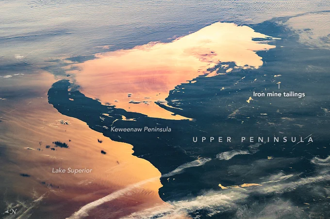 The Keweenaw peninsula in the upper peninsula of Michigan with the sun reflected on Lake Superior. 