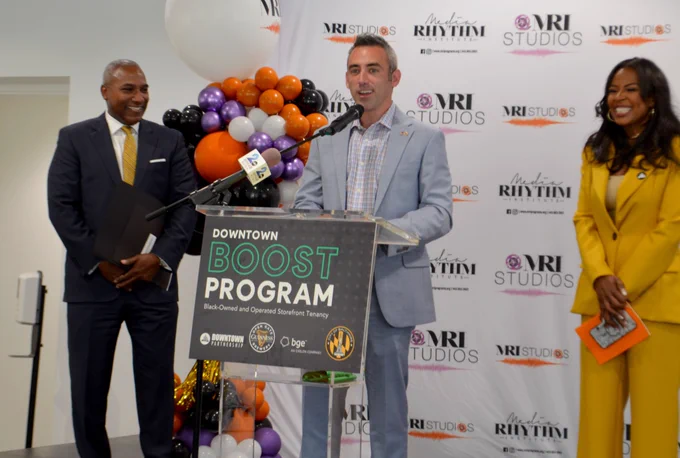 DHCD Secretary Jake Day speaks at the ribbon cutting ceremony at the Media Rhythm Institute on North Howard Street in Baltimore on May 17, 2023.
