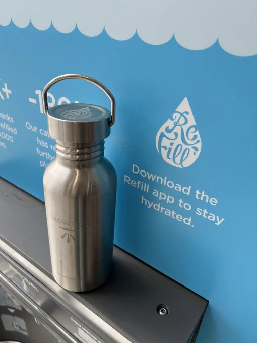 Steel Refill/Geovation water bottle on a water refill station