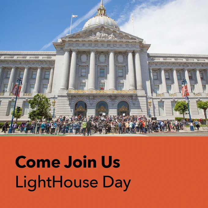 A large group of LightHouse staff, students, and supporters standing outside of San Francisco City Hall