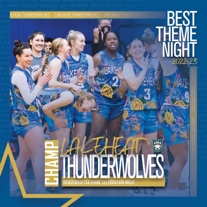 Graphic on blue background that features photo of Lakehead women’s basketball players celebrating while wearing themed Indigenous Cultural Celebration Night uniforms, ‘Best Theme Night’ text stacked in the upper right corner, slim gold rectangles on the top and right of the main image, and the award winner highlighted in white and gold text centered on the bottom third