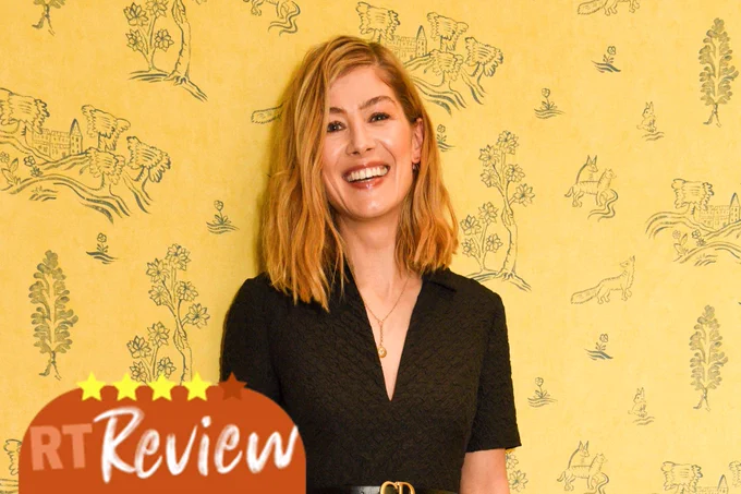 Rosamund Pike smiling in front of a yellow background with a four-star review label