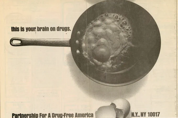 1980s add showing a skillet with a fried egg. Writing says "this is our brain on drugs. Partnership for a Drug-Free America. N.Y., NY 10017. 
