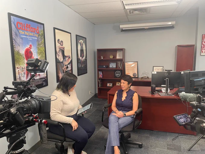 Commissioner del Castillo with Cheddar reporter Michelle Castillo in the former's office