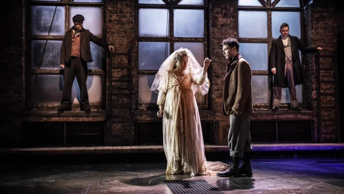 Production picture featuring Miss Havisham and Pip
