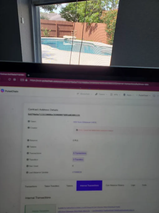 Texas sun beaming down bright onto my swimming pool in the background but in-focus of the camera lens, as seen through my open screened-in window framed by the wall past my laptop screen opened browser tab on the Pulse Chain eHEX Bridge Smart Contract address actively tabbed on the Internal Transactions.